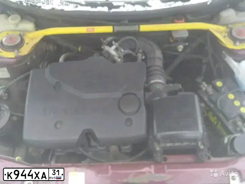 Фото автомобиля LADA 2112, 2004 — госномер Е945РР31. Цвет: ТЕМНО-МАЛИНОВЫЙ