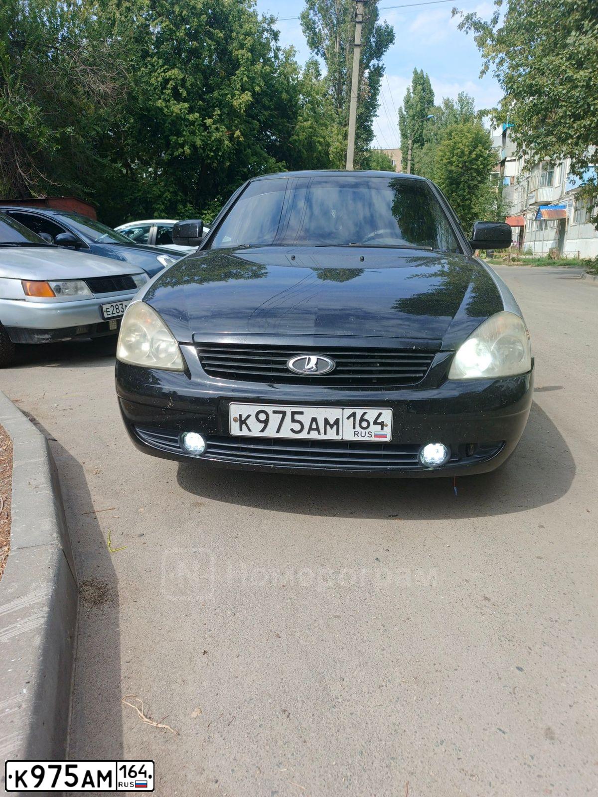 Фото автомобиля LADA 2172 PRIORA, 2012 — госномер К975АМ164. Цвет: Сине-Черный