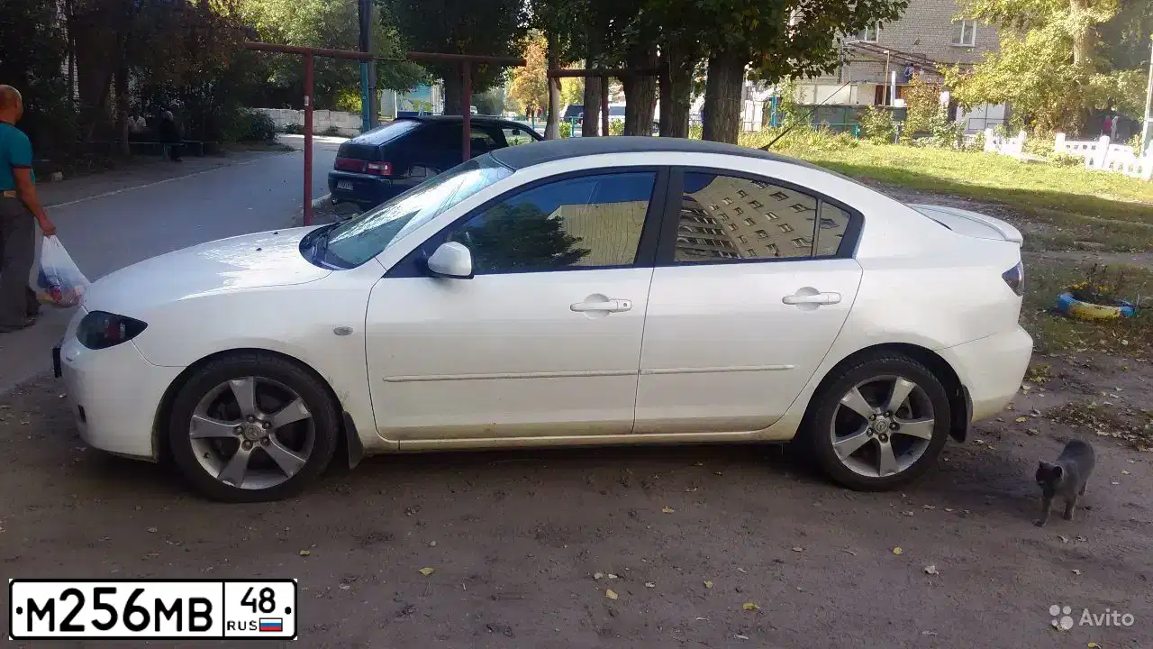 Фото автомобиля MAZDA A 3, 2008 — госномер У187РЕ33. Цвет: Белый
