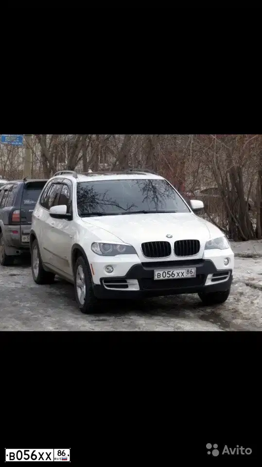 Фото автомобиля BMW X5, 2009 — госномер В056ХХ86. Цвет: Белый