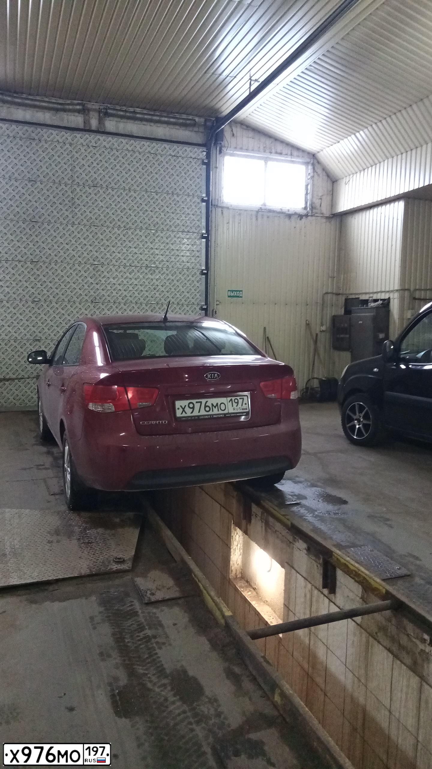 Фото автомобиля KIA CERATO, 2011 — госномер Т822МТ152. Цвет: Красный