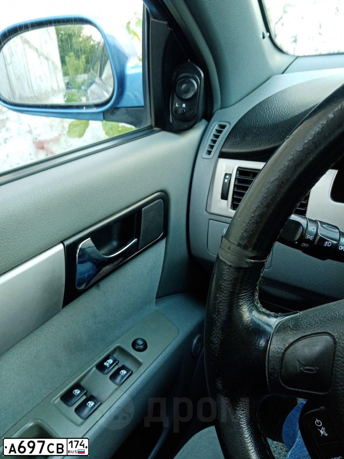 Фото автомобиля CHEVROLET LACETTI, 2007 — госномер Х319КК774. Цвет: синий