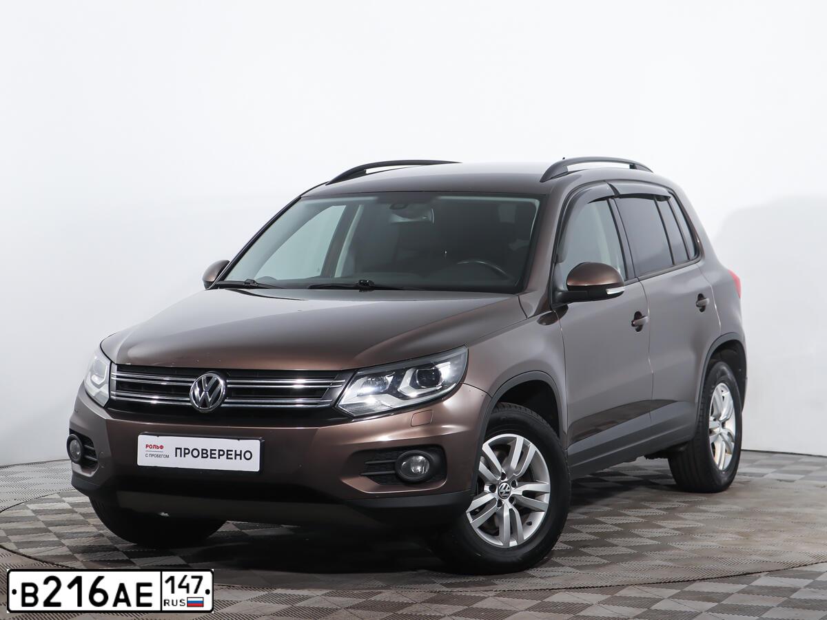 Фото автомобиля VOLKSWAGEN TIGUAN, 2014 — госномер Р947ОС198. Цвет: Коричневый