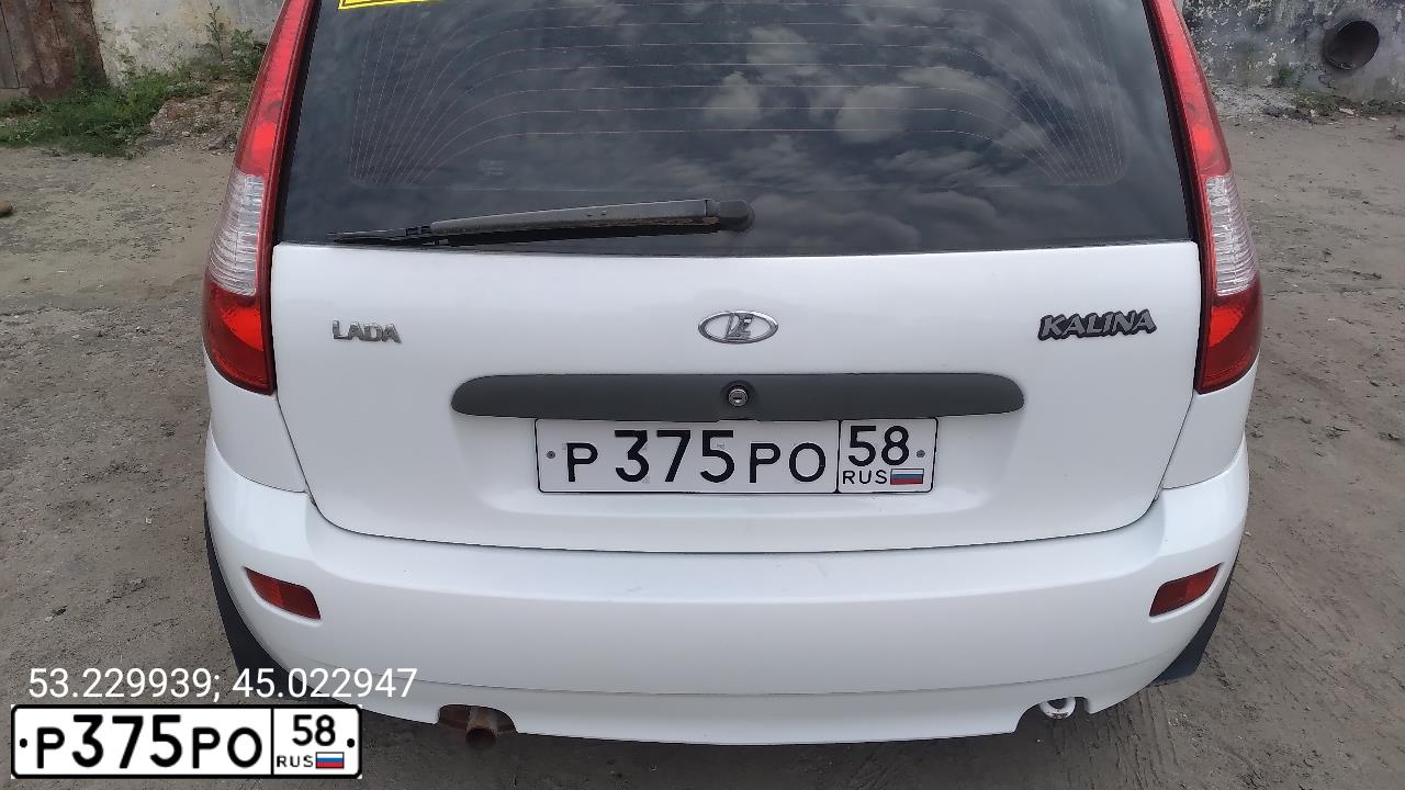 Фото автомобиля LADA 1119 KALINA, 2011 — госномер Р375РО58. Цвет: Белый
