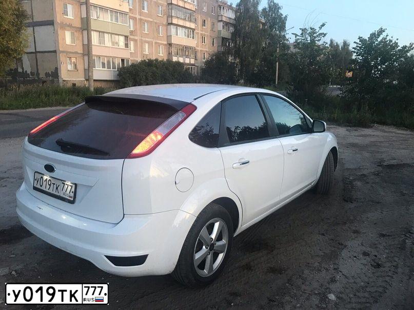 Фото автомобиля FORD FOCUS, 2011 — госномер О134МО48. Цвет: Белый
