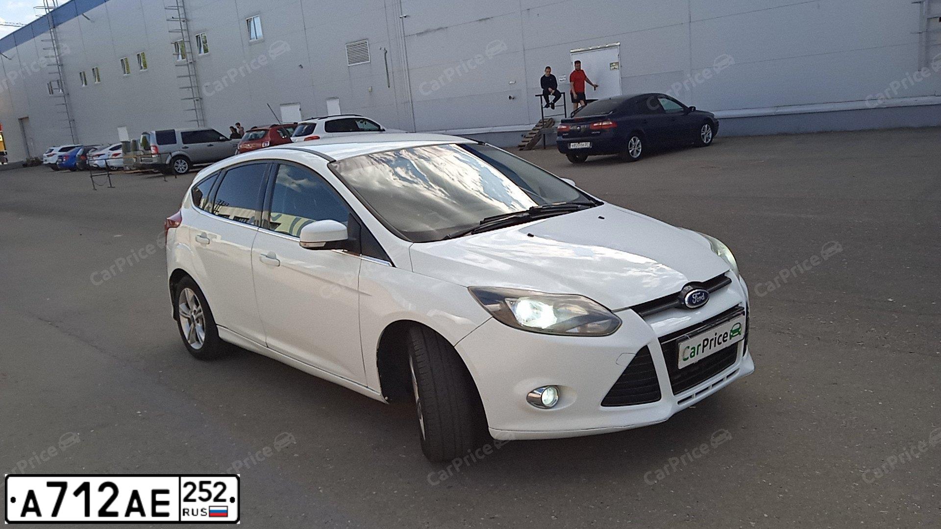 Фото автомобиля FORD FOCUS, 2012 — госномер А712АЕ252. Цвет: Белый
