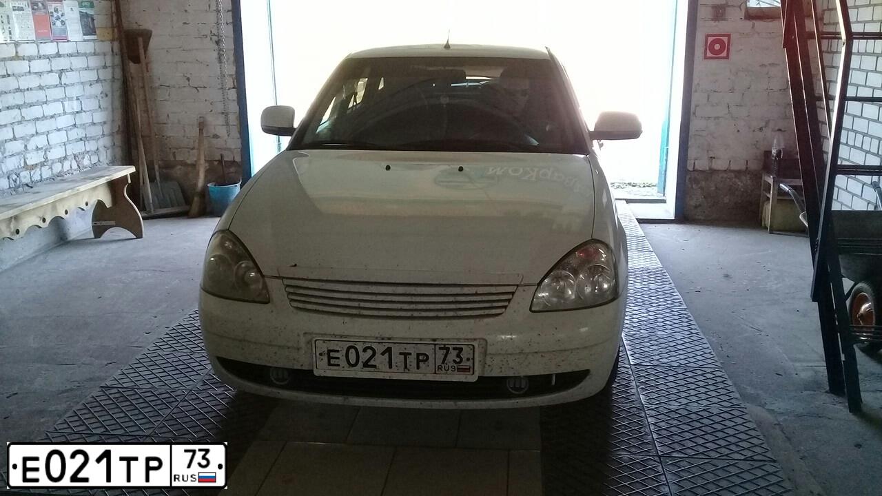 Фото автомобиля LADA 2172 PRIORA, 2011 — госномер Е937ВН73. Цвет: БЕЛЫЙ