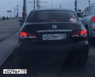 Фото автомобиля NISSAN ALMERA /AVTOVAZ/, 2017 — госномер Х029ВР178. Цвет: ЧЕРНЫЙ