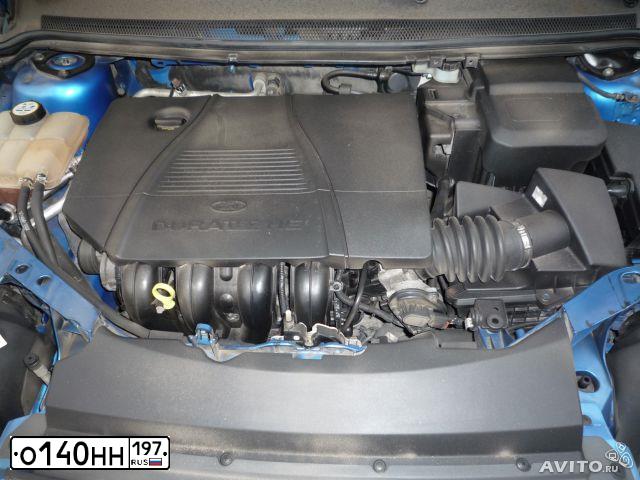 Фото автомобиля FORD FOCUS, 2006 — госномер Е877ХУ123. Цвет: ГОЛУБОЙ