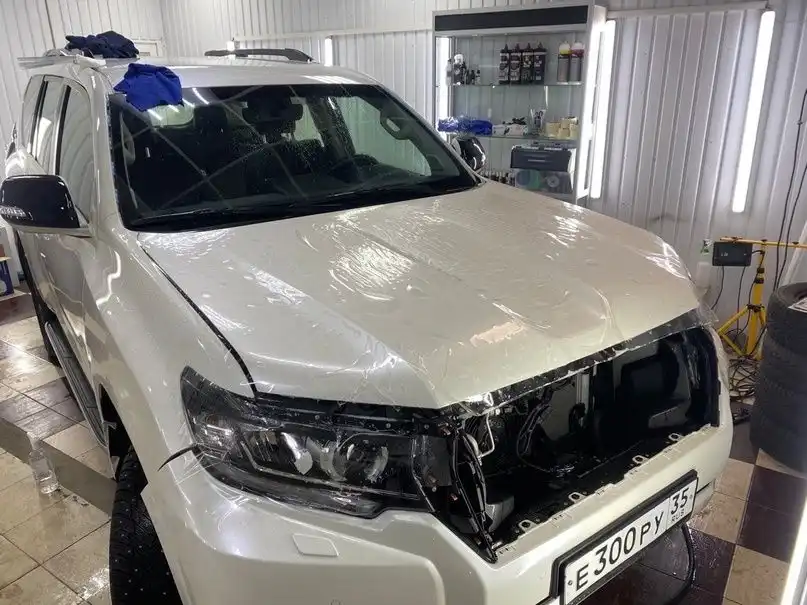 Фото автомобиля TOYOTA HILUX, 2016 — госномер Е300РУ35. Цвет: ЧЕРНЫЙ