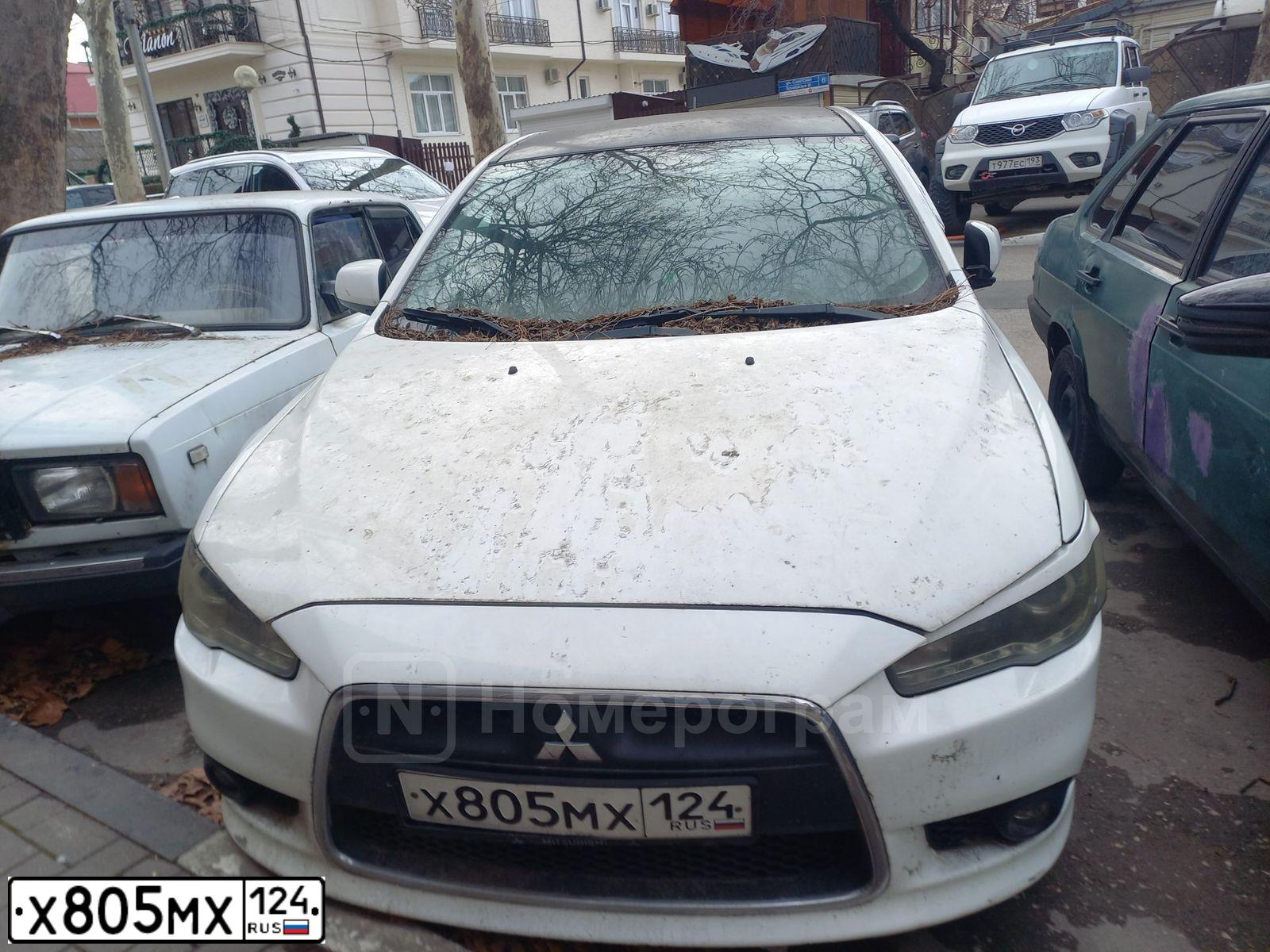 Фото автомобиля MITSUBISHI LANCER, 2012 — госномер Х805МХ124. Цвет: БЕЛЫЙ