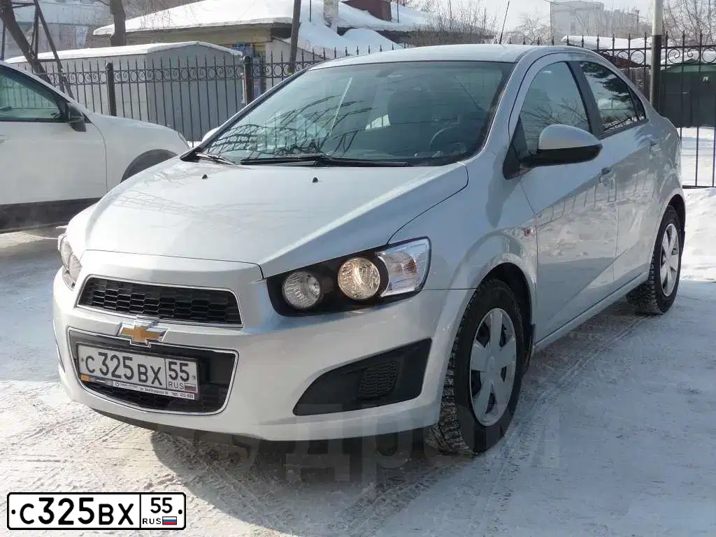 Фото автомобиля CHEVROLET AVEO, 2012 — госномер С325ВХ55. Цвет: СЕРЕБРИСТЫЙ