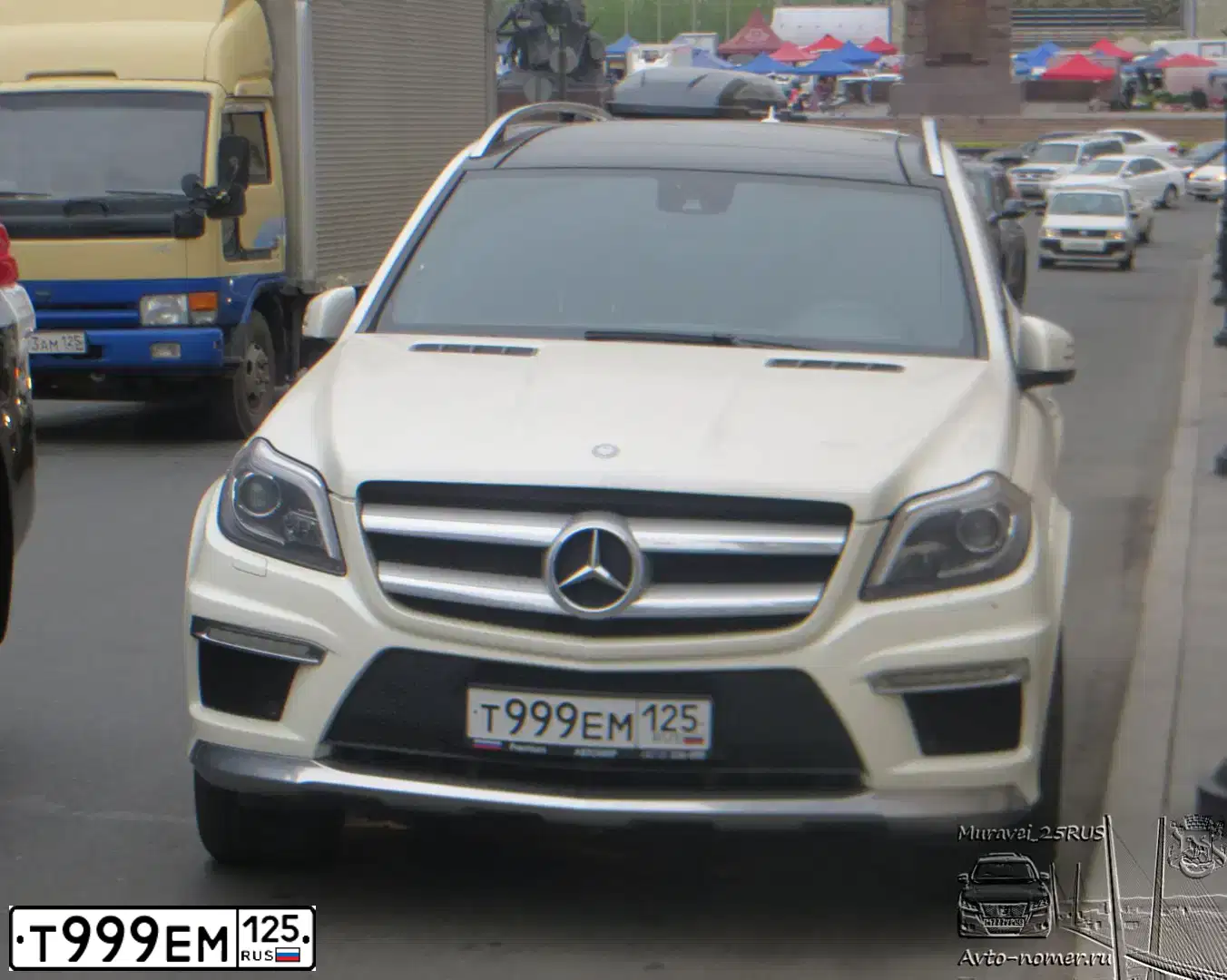 Фото автомобиля SSANGYONG KYRON, 2010 — госномер Т999ЕМ25. Цвет: ЧЕРНЫЙ