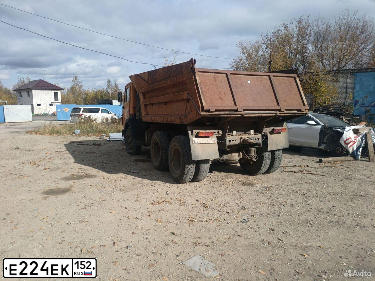Фото автомобиля KAMAZ 55110 /6X4/, 1988 — госномер Е224ЕК152. Цвет: ОРАНЖЕВЫЙ