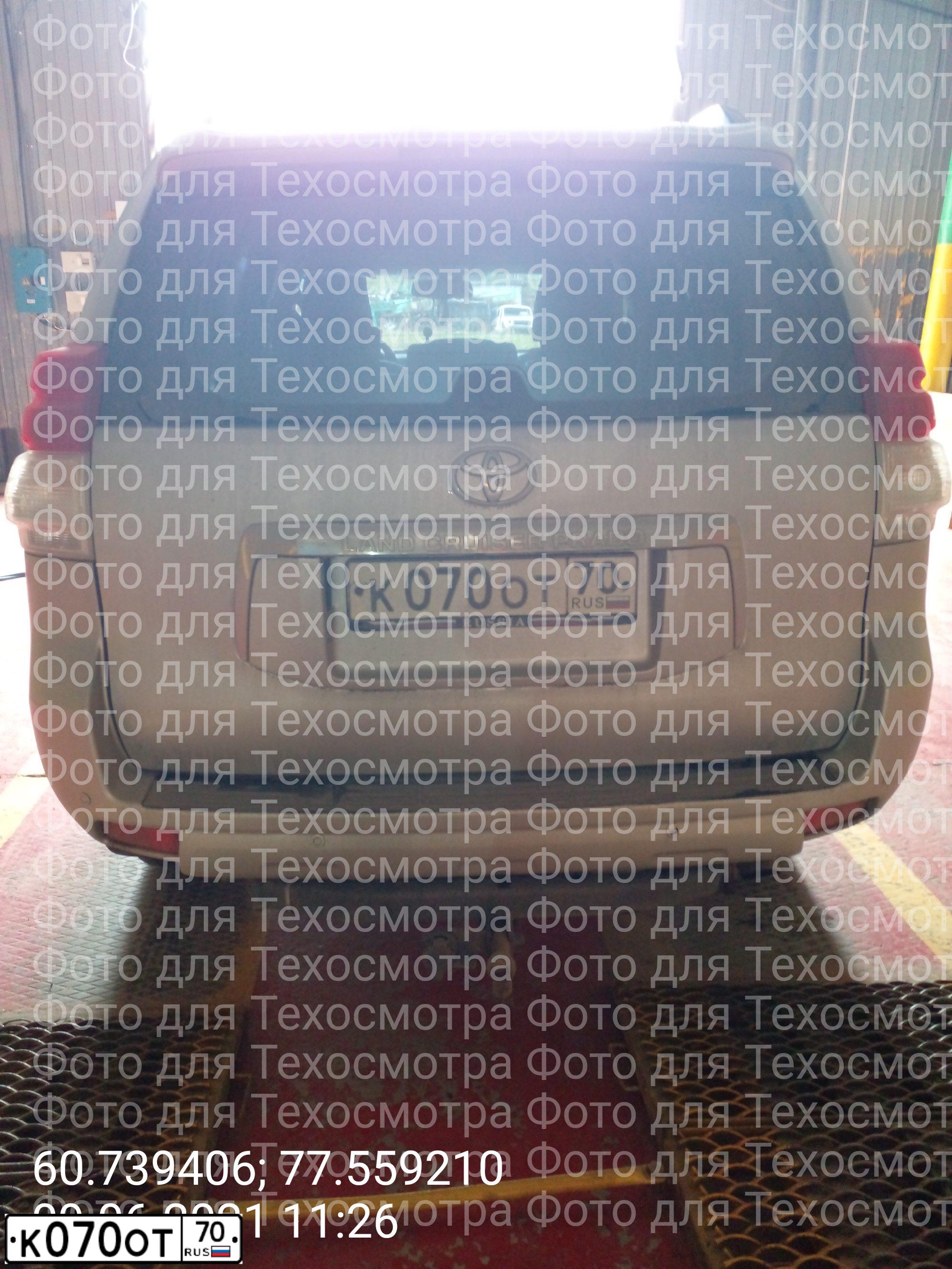 Фото автомобиля TOYOTA LANDCRUISER, 2012 — госномер К070ОТ70. Цвет: серебристый