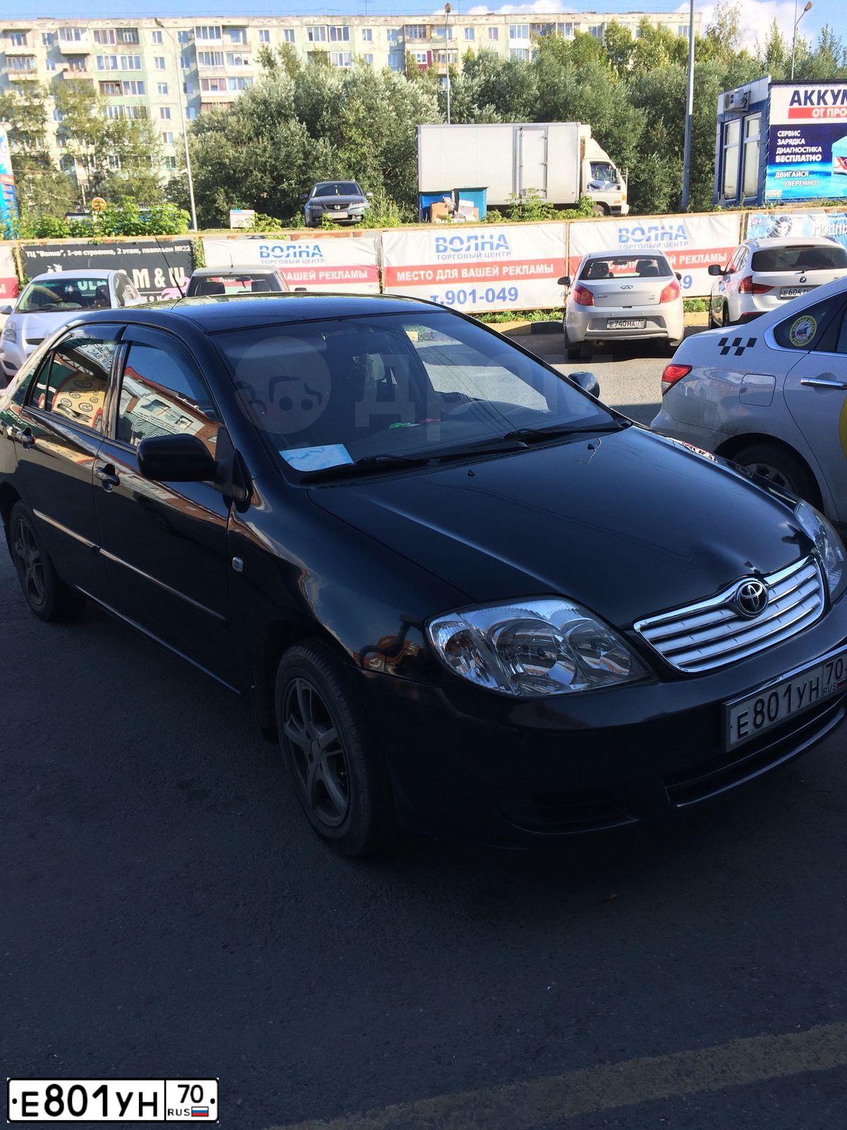 Фото автомобиля TOYOTA COROLLA, 2005 — госномер О706МК70. Цвет: ЧЕРНЫЙ