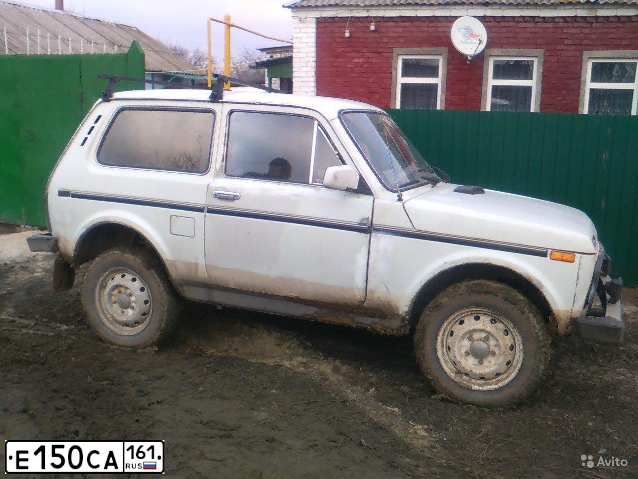 Фото автомобиля LADA 2121 NIVA, 1996 — госномер Е150СА161. Цвет: Белый