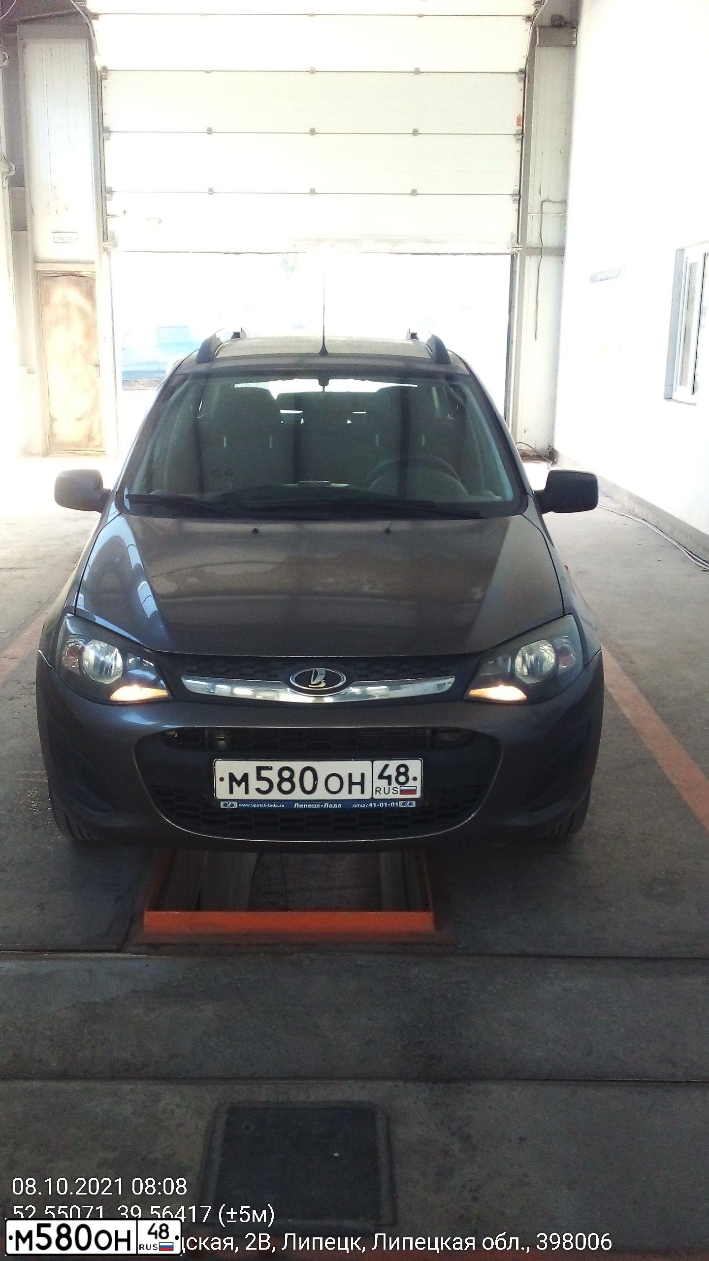 Фото автомобиля LADA LARGUS, 2014 — госномер М580ОН48. Цвет: ТЕМНО КОРИЧНЕВЫЙ