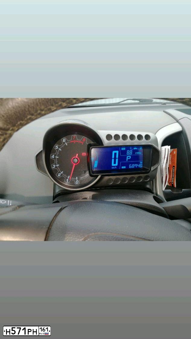 Фото автомобиля CHEVROLET AVEO, 2013 — госномер Н571РН161. Цвет: синий