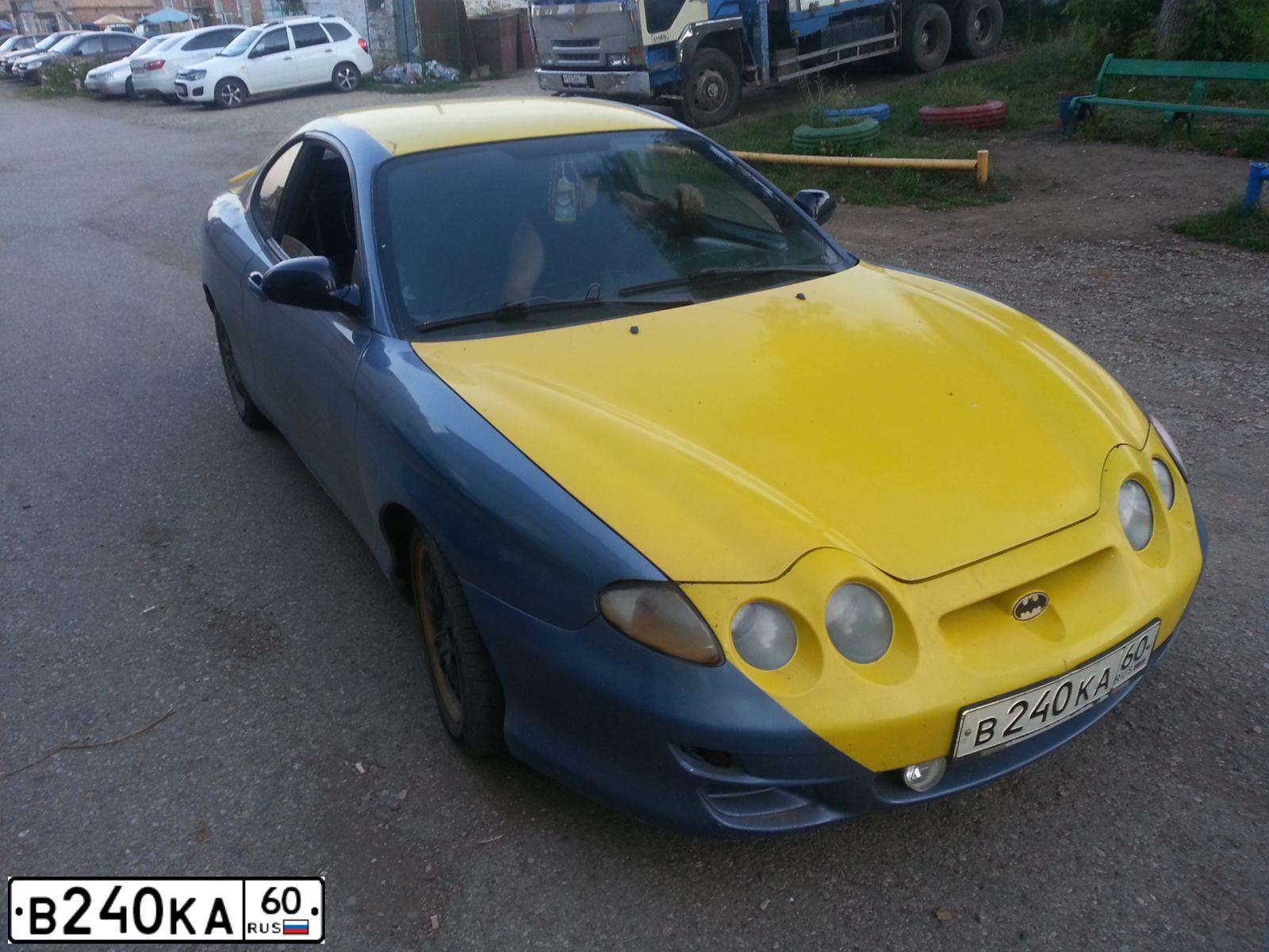 Фото автомобиля HYUNDAI TIBURON, 2000. Цвет: ЖЁЛТЫЙ