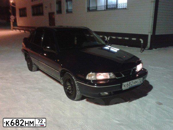 Фото автомобиля DAEWOO NEXIA, 2008 — госномер К682НМ72. Цвет: ЧЕРНО-СИНИЙ