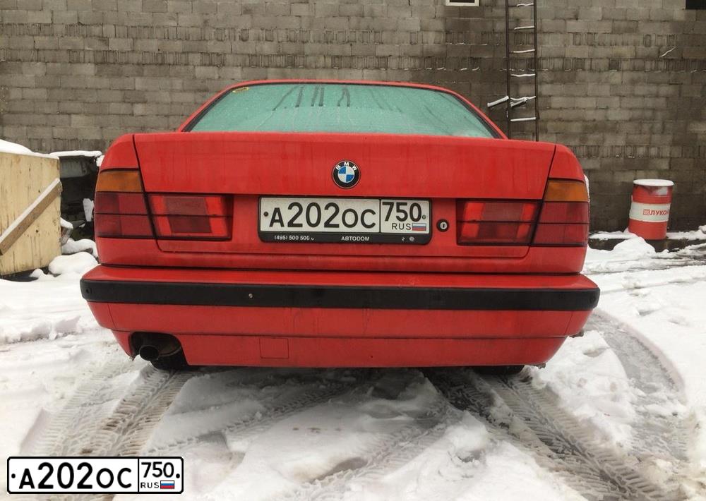 Фото автомобиля BMW W SERIE 5, 1991 — госномер У496ЕТ799. Цвет: Красный