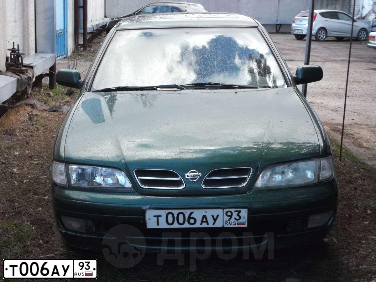 Фото автомобиля KIA RIO, 2013 — госномер Т006АУ93. Цвет: Белый