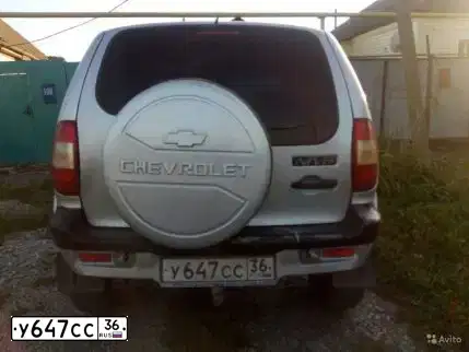 Фото автомобиля CHEVROLET NIVA, 2004 — госномер Е444ЕК68. Цвет: СВЕТЛО-СЕРЕБРИСТЫЙ  МЕТАЛЛИК
