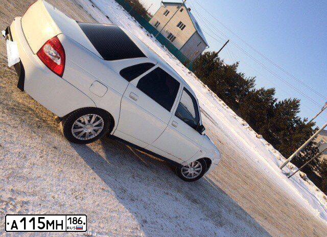 Фото автомобиля LADA 2170 PRIORA, 2009 — госномер Р881МТ72. Цвет: БЕЛЫЙ