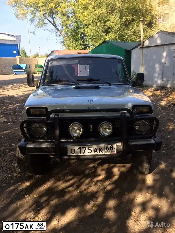 Фото автомобиля LADA 2131 NIVA, 2006 — госномер О175АК68. Цвет: Серебристо-желто-голубой
