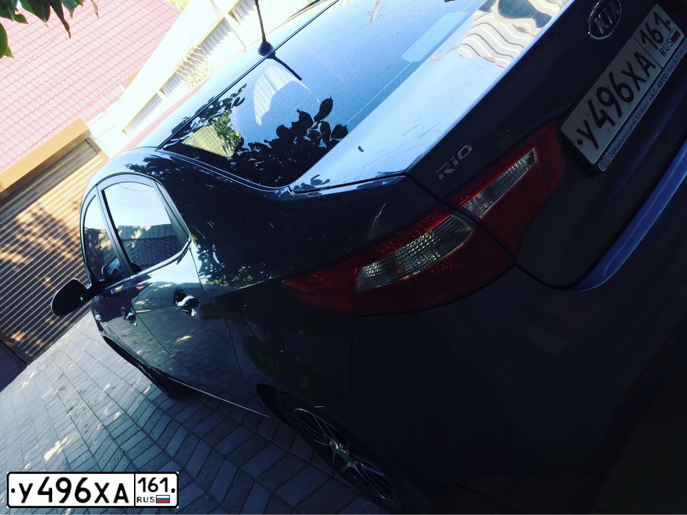 Фото автомобиля KIA RIO, 2011 — госномер К009ВМ82. Цвет: СЕРЫЙ