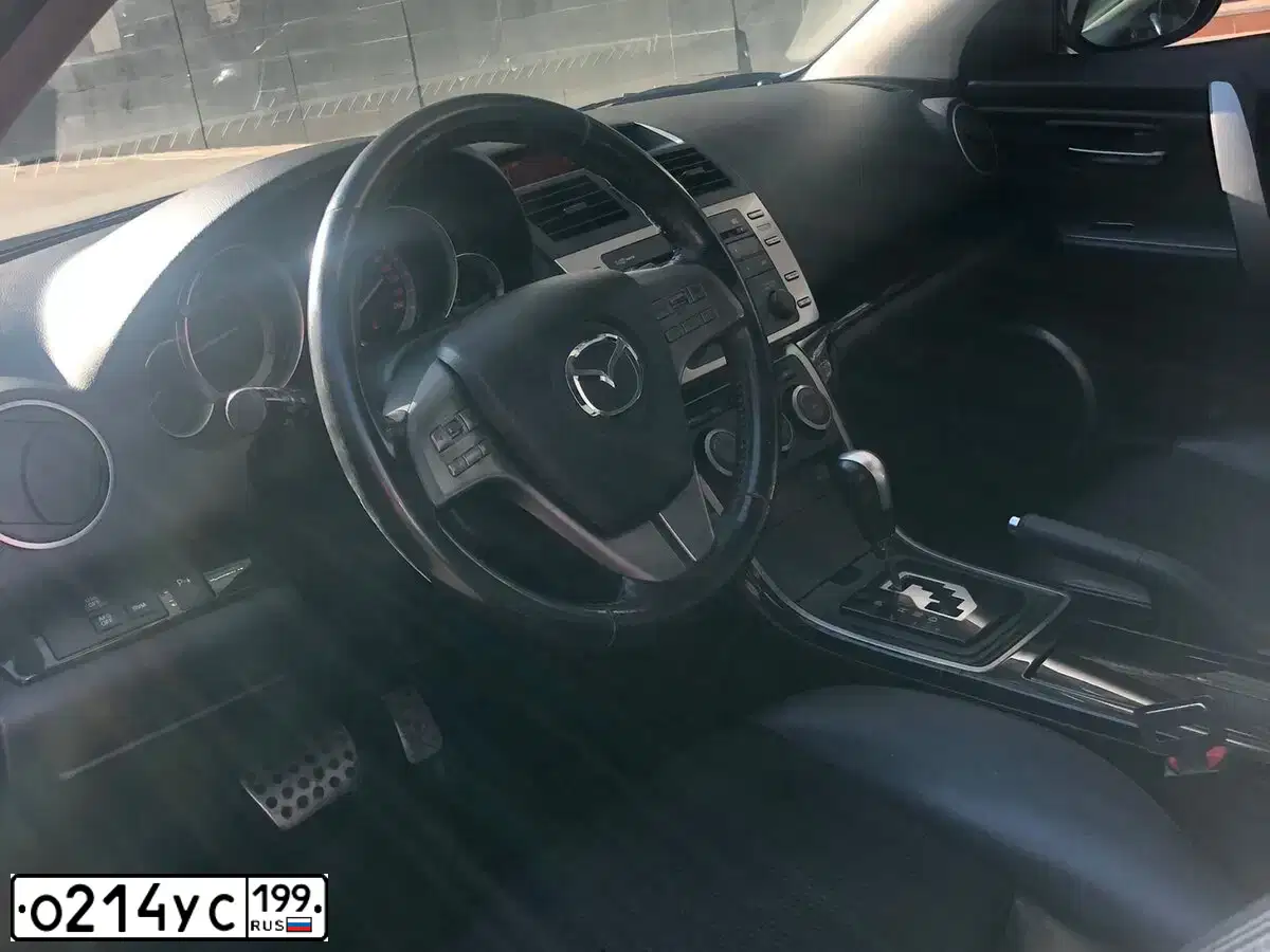 Фото автомобиля MAZDA 6, 2008 — госномер О214УС199. Цвет: СИРЕНЕВЫЙ