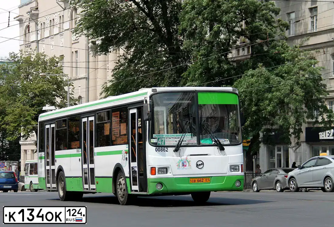 Фото автомобиля LIAZ 5256, 2011 — госномер К134ОК124. Цвет: белый зеленый
