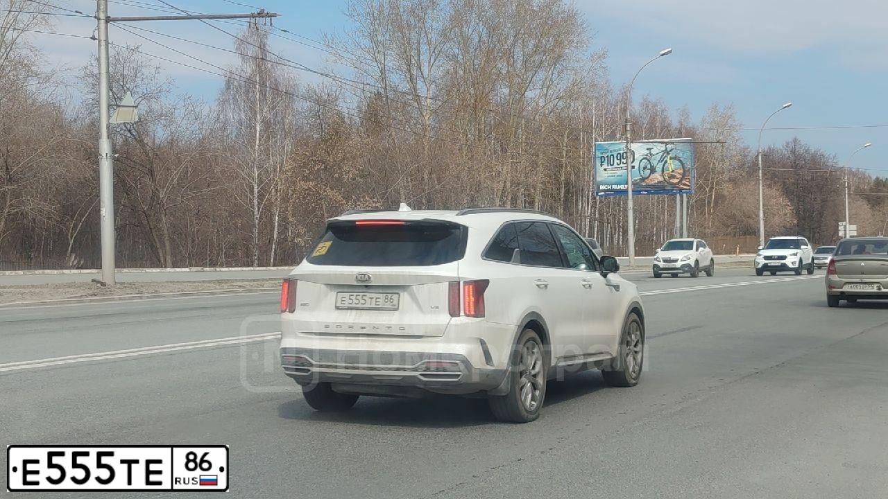 Фото автомобиля KIA SPORTAGE, 2017 — госномер О453КТ154. Цвет: Коричневый