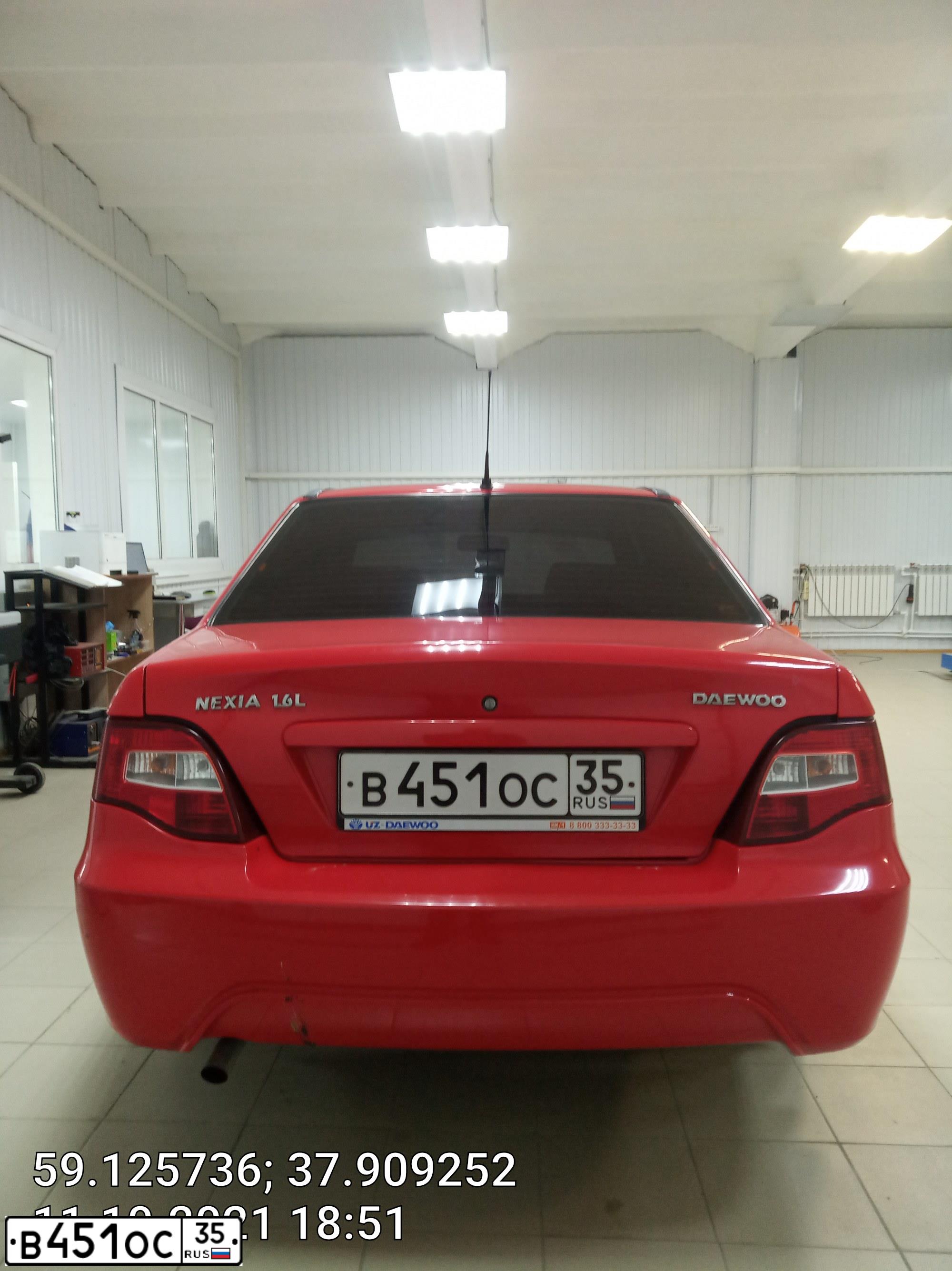 Фото автомобиля DAEWOO NEXIA, 2011 — госномер В451ОС35. Цвет: ЯРКО-КРАСНЫЙ