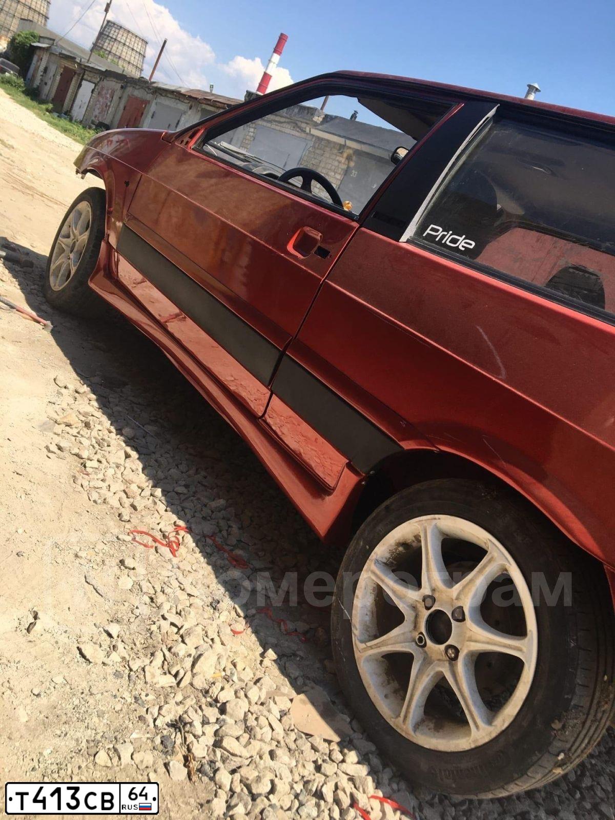 Фото автомобиля LADA 2113 SAMARA, 2006 — госномер Т413СВ64. Цвет: КРАСНЫЙ