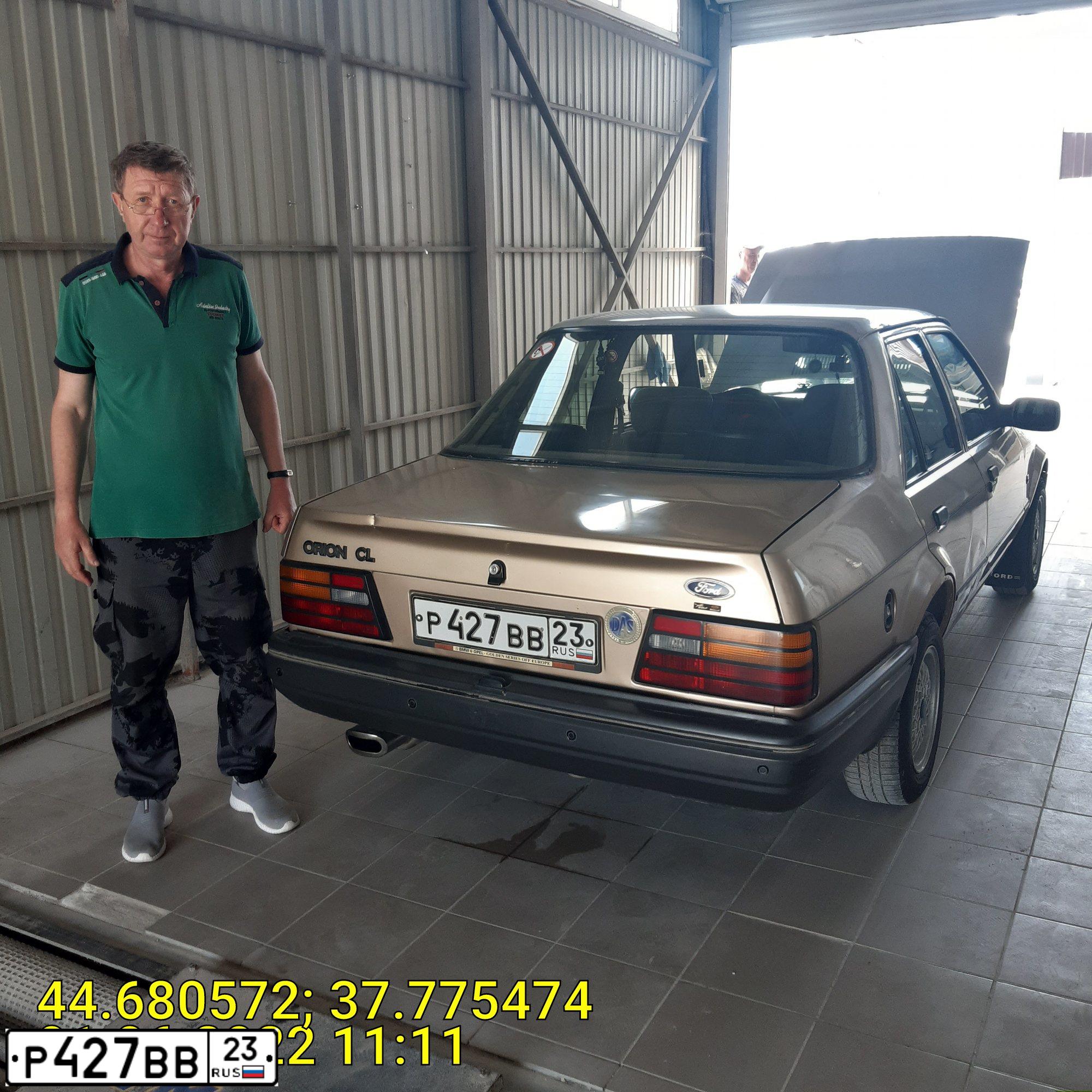 Фото автомобиля FORD ORION, 1989 — госномер Р427ВВ23. Цвет: ТЕМНО БЕЖЕВЫЙ