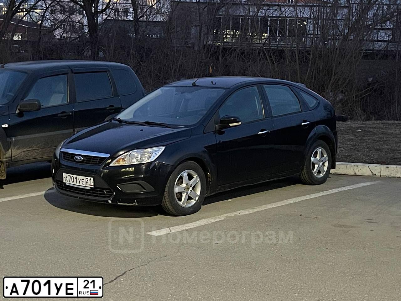 Фото автомобиля FORD FOCUS, 2010 — госномер А701УЕ21. Цвет: ЧЕРНЫЙ