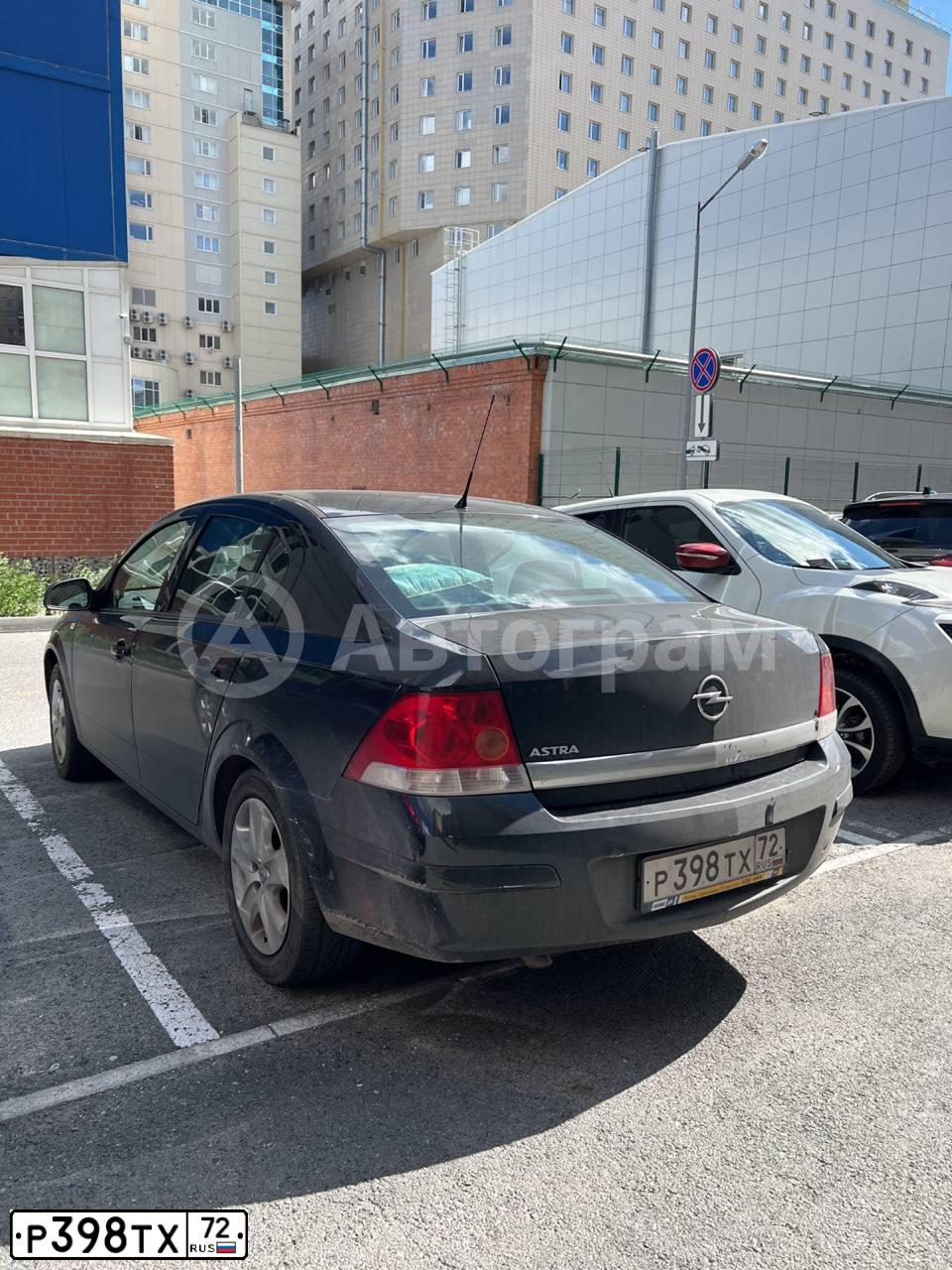 Фото автомобиля OPEL ASTRA, 2014 — госномер Р398ТХ72. Цвет: ЧЕРНЫЙ