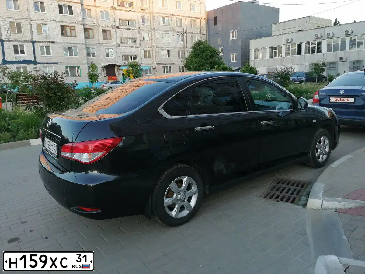 Фото автомобиля NISSAN ALMERA /AVTOVAZ/, 2014 — госномер О495АК46. Цвет: ЧЕРНЫЙ