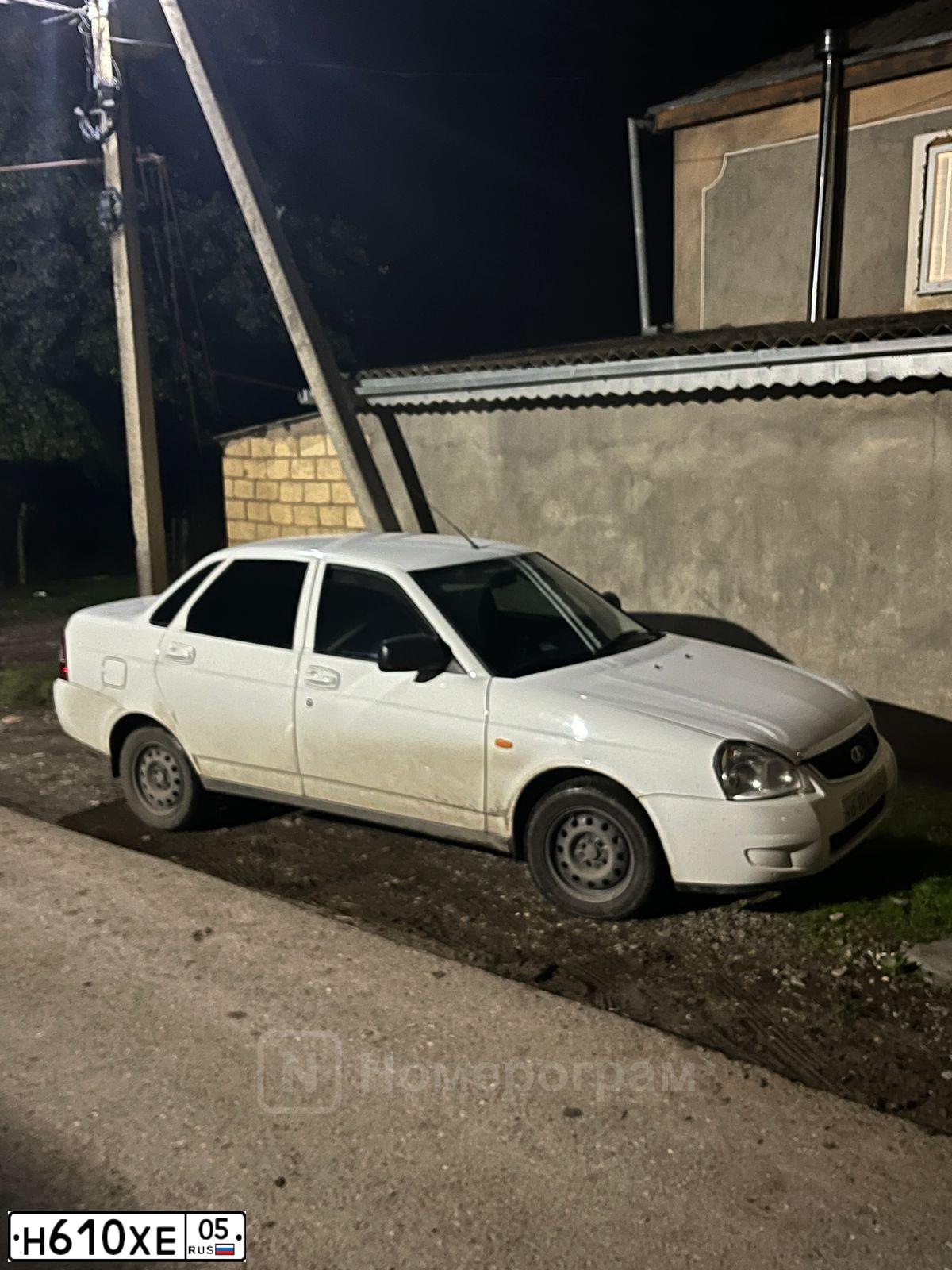 Фото автомобиля LADA 2170 PRIORA, 2015 — госномер Н610ХЕ05. Цвет: БЕЛЫЙ