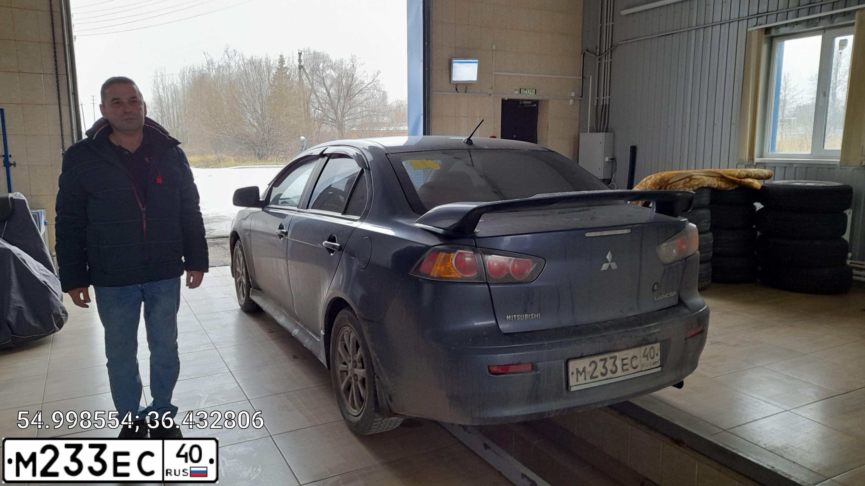 Фото автомобиля MITSUBISHI LANCER, 2007 — госномер М233ЕС40. Цвет: ЧЕРНЫЙ