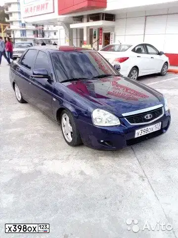 Фото автомобиля LADA 2170 PRIORA, 2015 — госномер М124ОХ134. Цвет: синий