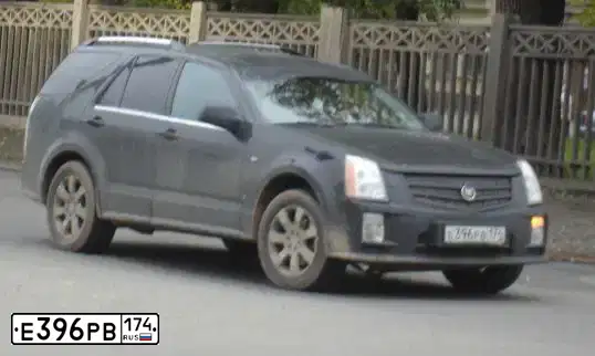 Фото автомобиля КАДИЛЛАКGМТ265(6ЕВ, 2007 — госномер Е396РВ174. Цвет: ЧЕРНЫЙ