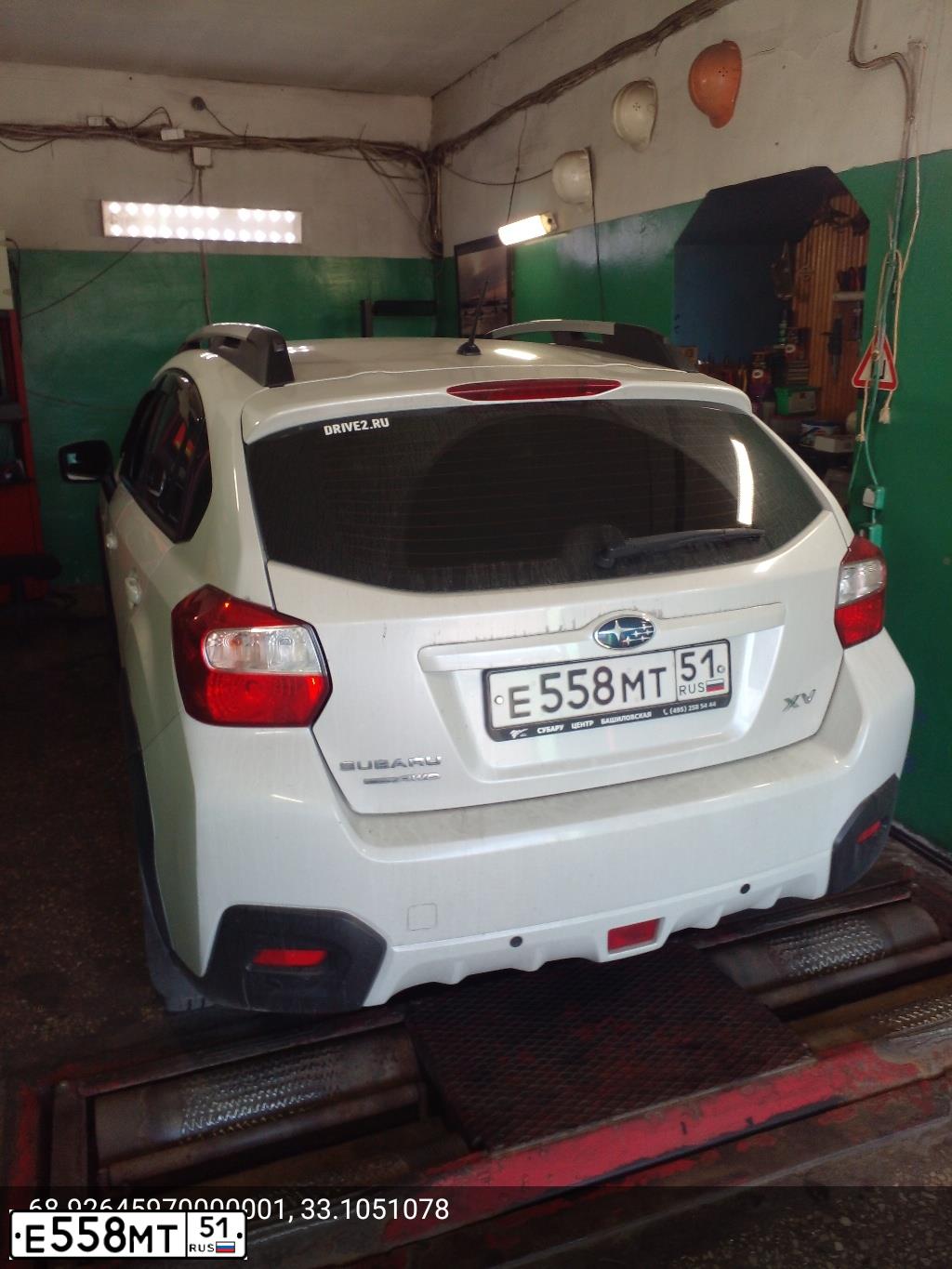 Фото автомобиля SUBARU IMPREZA, 2012 — госномер Е208УО197. Цвет: Белый