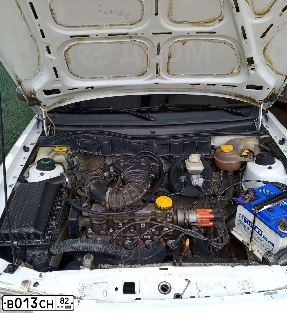 Фото автомобиля OPEL ASTRA, 1995 — госномер Е124АА164. Цвет: Белый