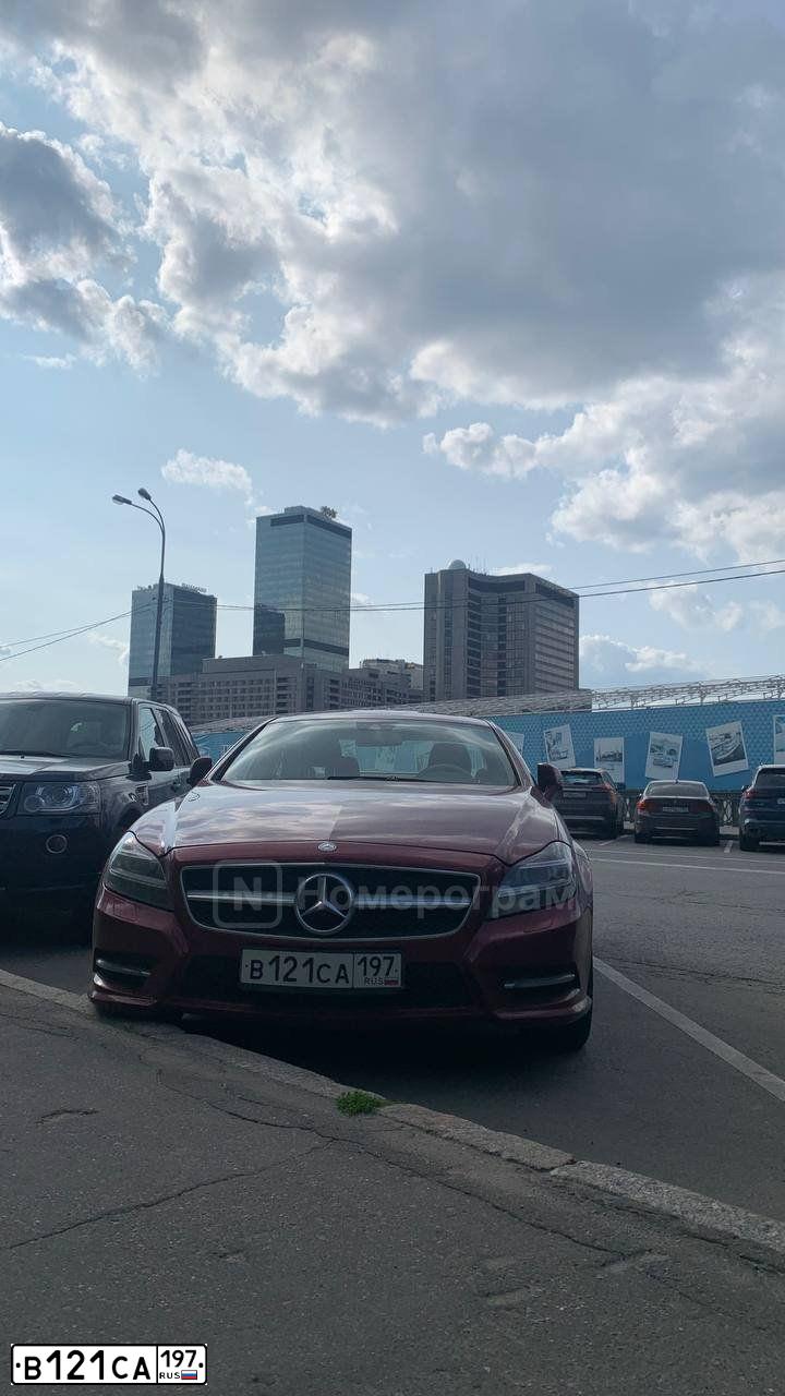 Фото автомобиля МЕРСЕДЕС-БЕНЦ CLS500 4 MATIC, 2011 — госномер Х980ОК37. Цвет: ТЕМНО КРАСНЫЙ
