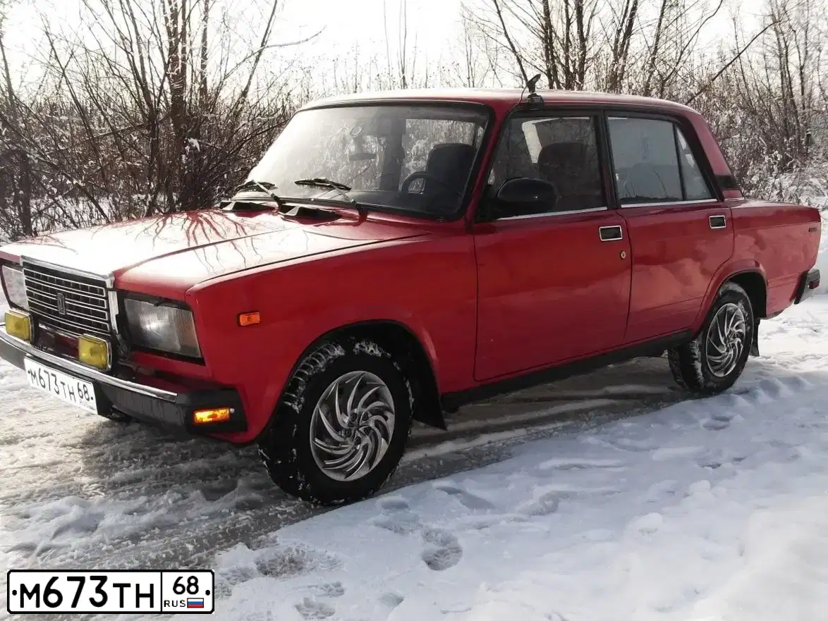 Фото автомобиля LADA 2107, 1994 — госномер М989ОУ68. Цвет: Красный