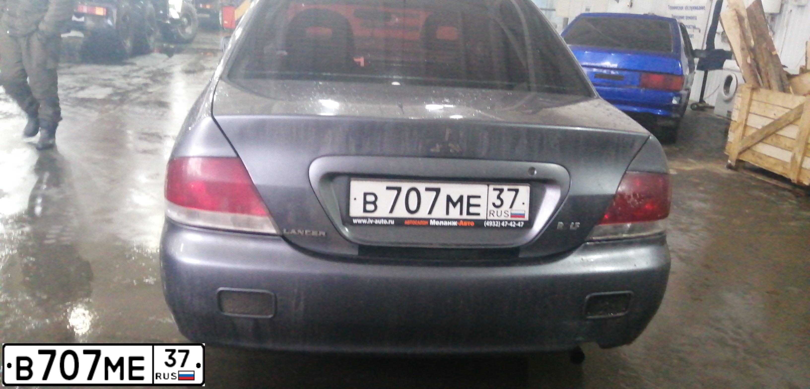 Фото автомобиля MITSUBISHI LANCER, 2005 — госномер В025СХ37. Цвет: СЕРЫЙ