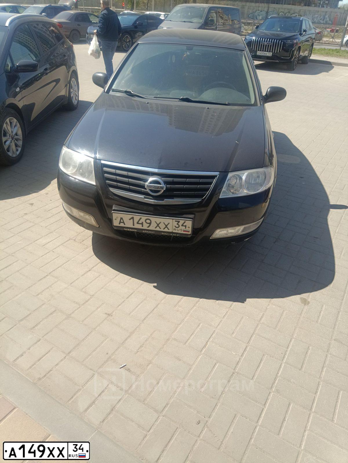 Фото автомобиля NISSAN ALMERA, 2010 — госномер А149ХХ34. Цвет: ЧЕРНЫЙ